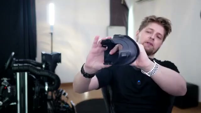 Thomas holding the BOBOVR F3 facial interface from the face side